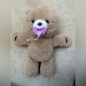 Live little pets Sleeping Teddy Bear with Purple Pacifier battery operated